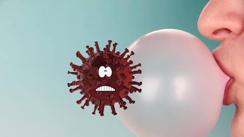 Een kauwgombel waar een verschrikt virusdeeltje aan vastplakt